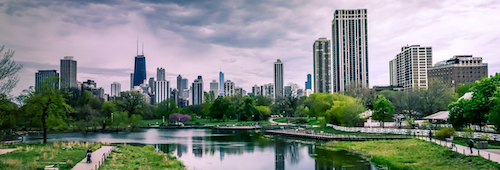 city scape with a lagoon and trees